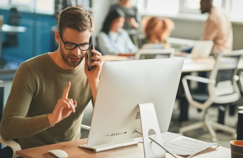 Patient call-center operator gesturing during a phone-call